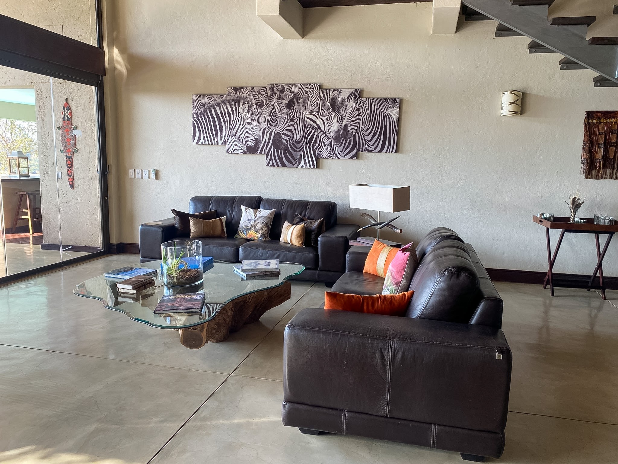Interior lounge open to the deck and reserve view