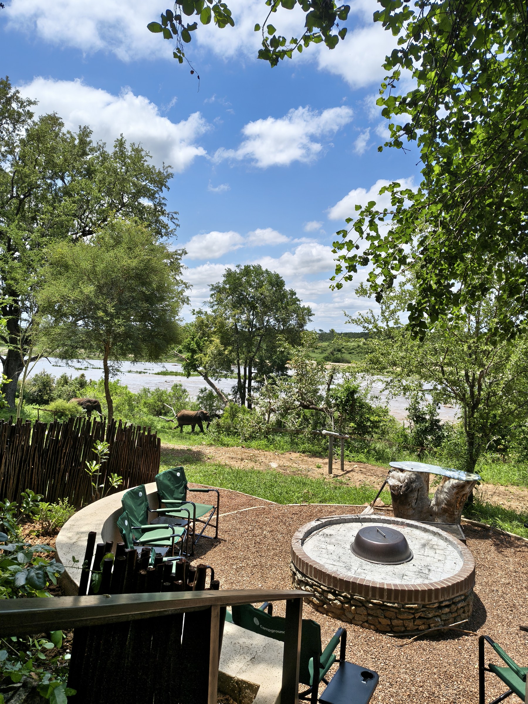 A firepit overlooking the reserve at Ngulube River Lodge